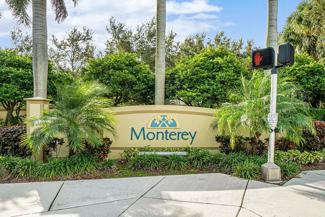 a sign on the side of a street