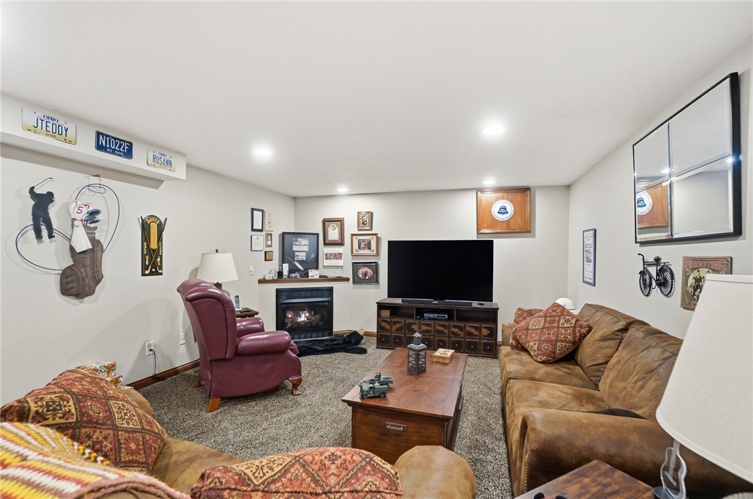 5300 Brookshire Lane Springfield, OH 45502 - Photo 45 of 56 This inviting family room features a cozy fireplace, perfect for relaxing evenings.