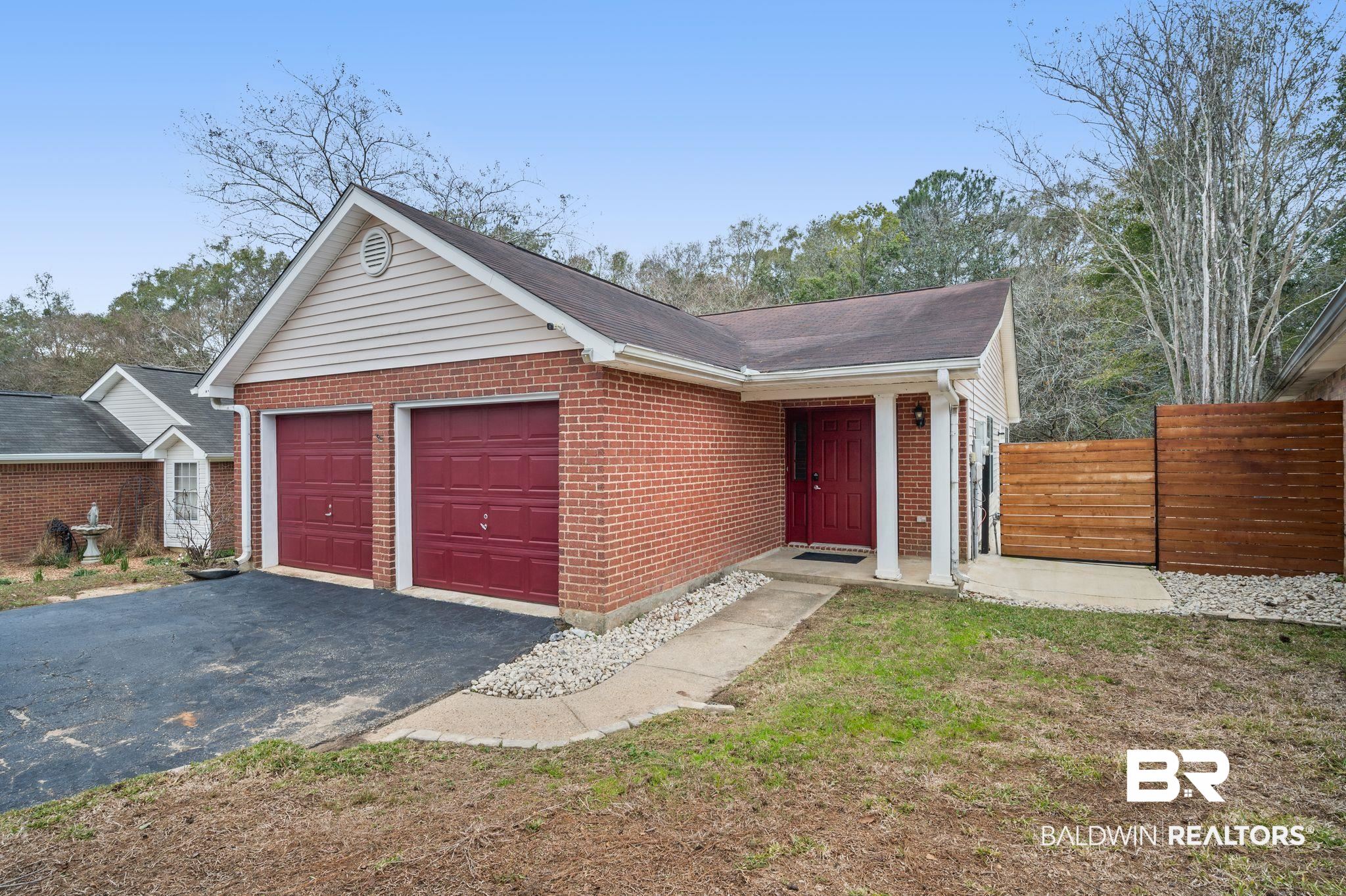 3716 Pepper Ridge Drive Mobile, AL 36693 - Photo 2 of 20 Single story home featuring a garage