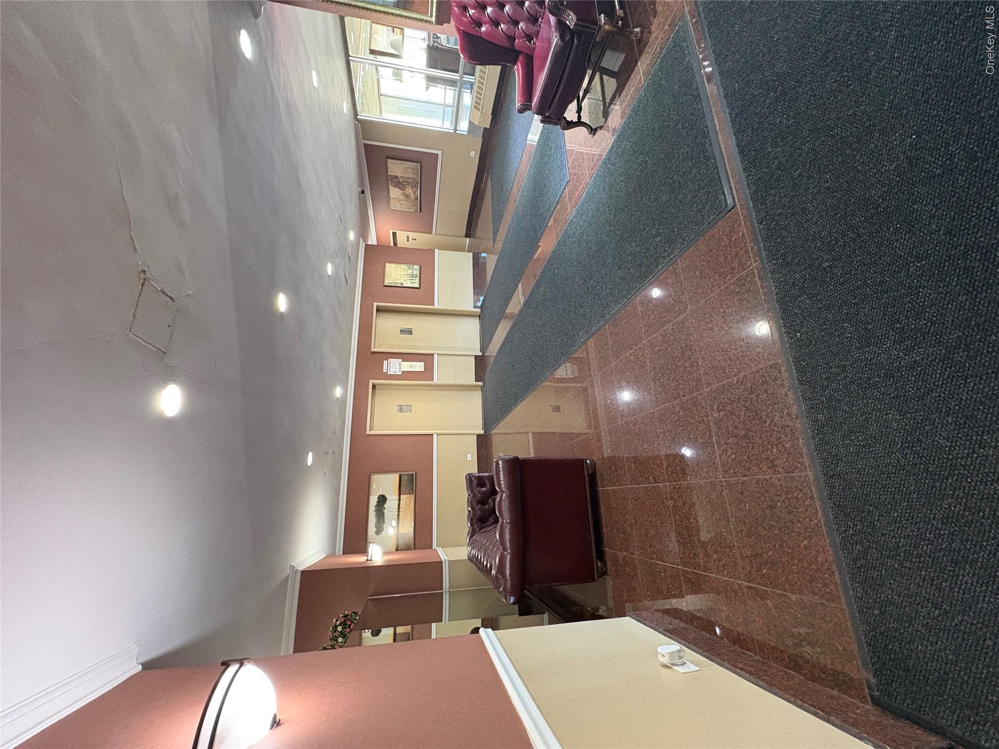 3121 Middletown Road, Unit 1G Bronx, NY 10461 - Photo 6 of 19 a lobby with furniture and window