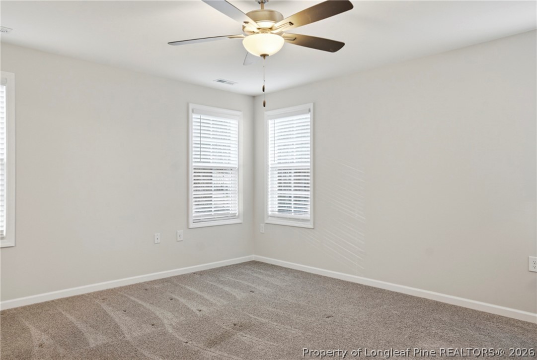 106 Knotts Berry Road Bunnlevel, NC 28323 - Photo 24 of 50 a view of an empty room with a window