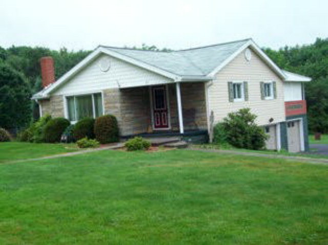 185 Kohlersburg Road New Bethlehem, PA 16242 - Photo 1 of 1 a view of a house with backyard and garden