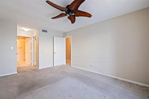 a view of a bathroom with sink and shower
