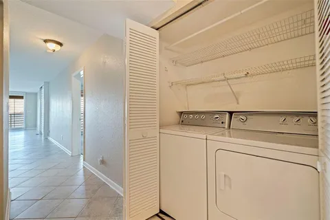 a view of a balcony with chairs
