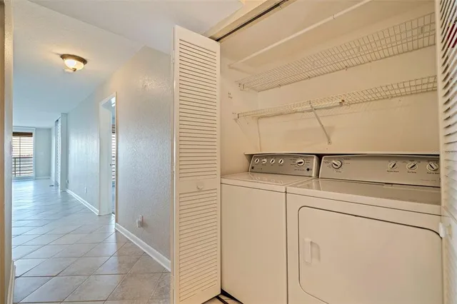 a view of a balcony with chairs