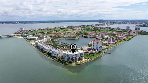 a view of a swimming pool with a backyard