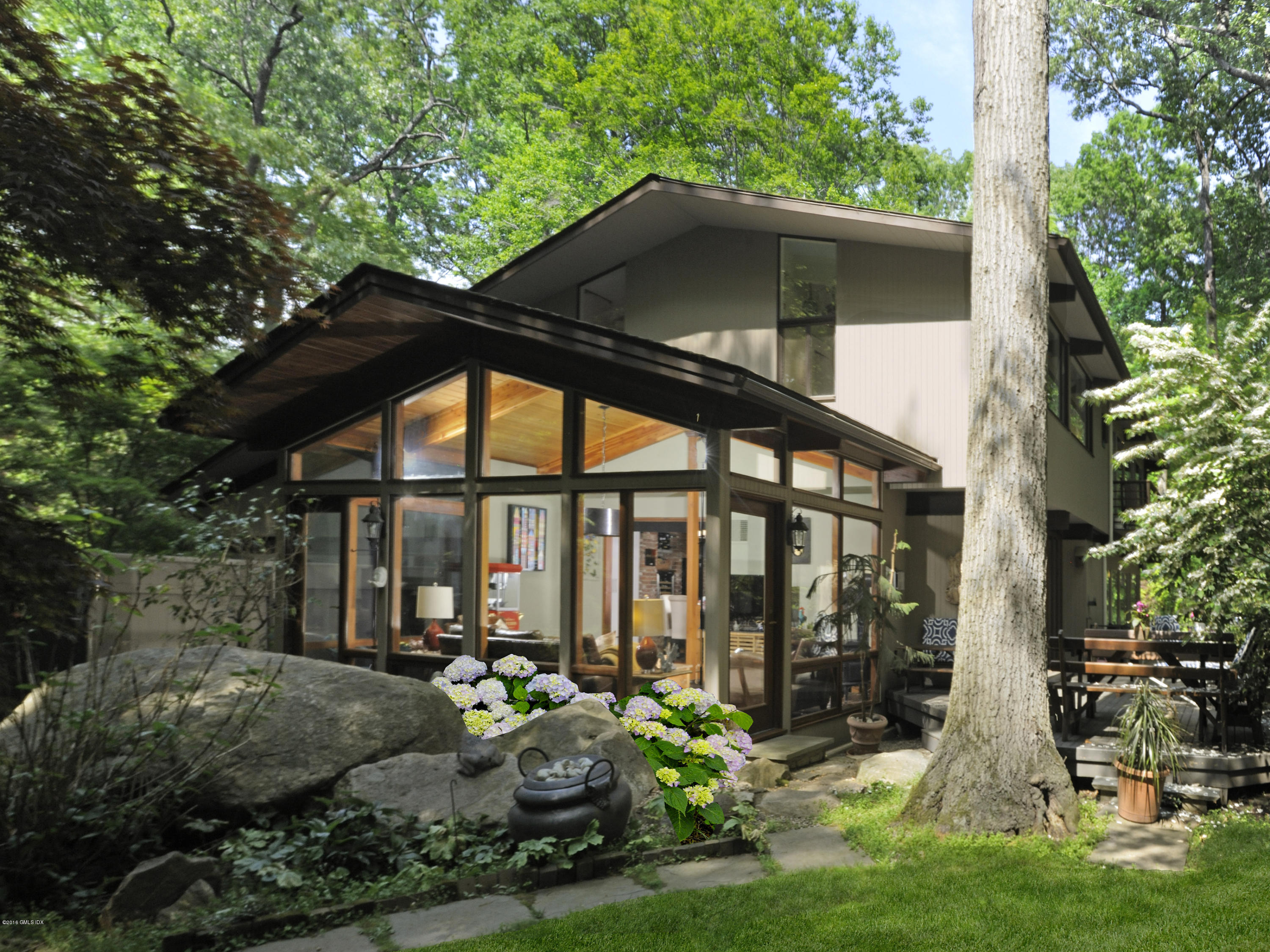 18 Ferncliff Road Cos Cob, CT 06807 - Photo 1 of 24 a view of a house with backyard and sitting area