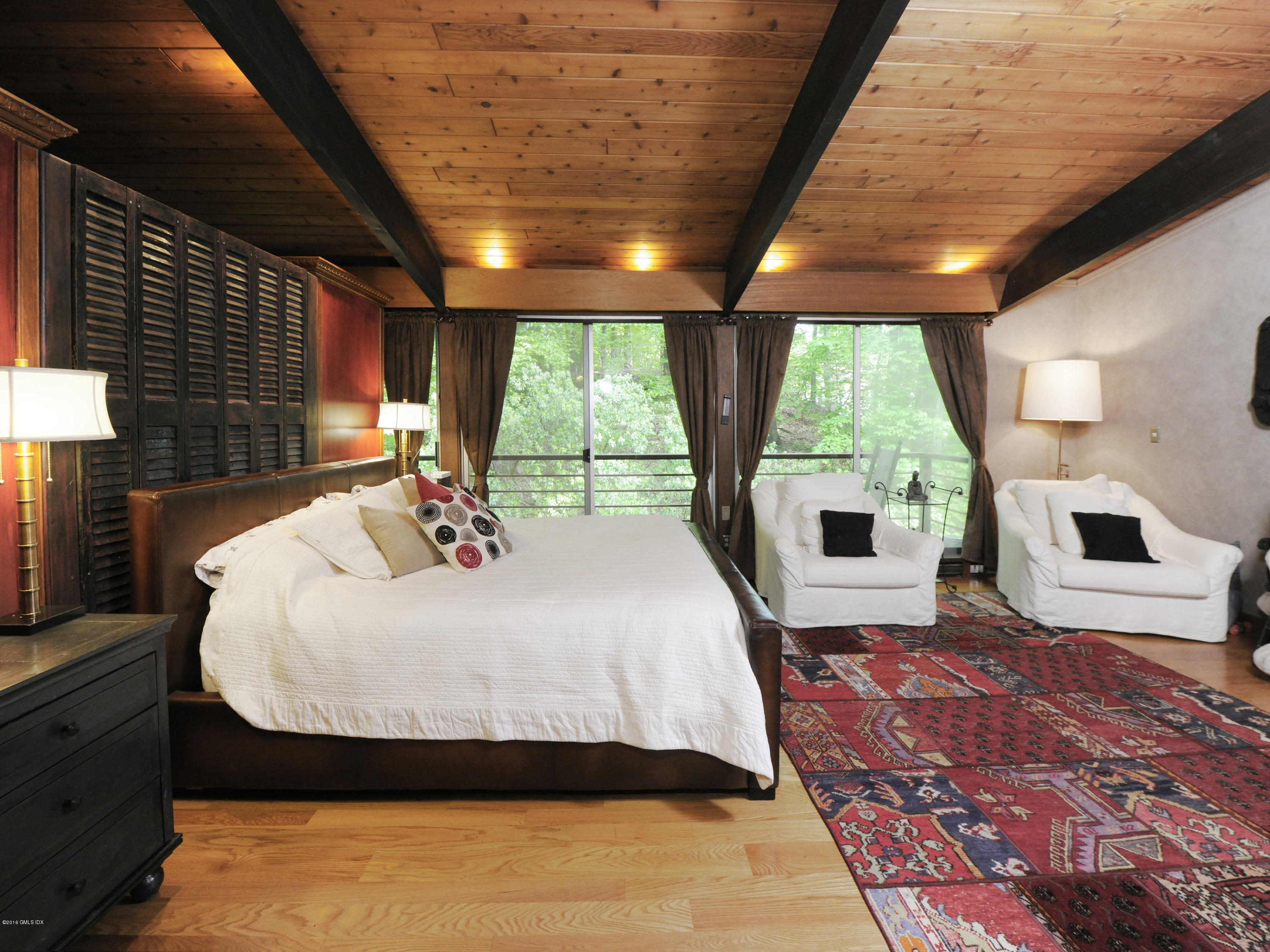 18 Ferncliff Road Cos Cob, CT 06807 - Photo 14 of 24 a large bedroom with a large bed and a large window