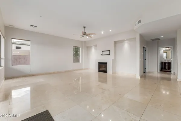 a view of a hallway with a kitchen