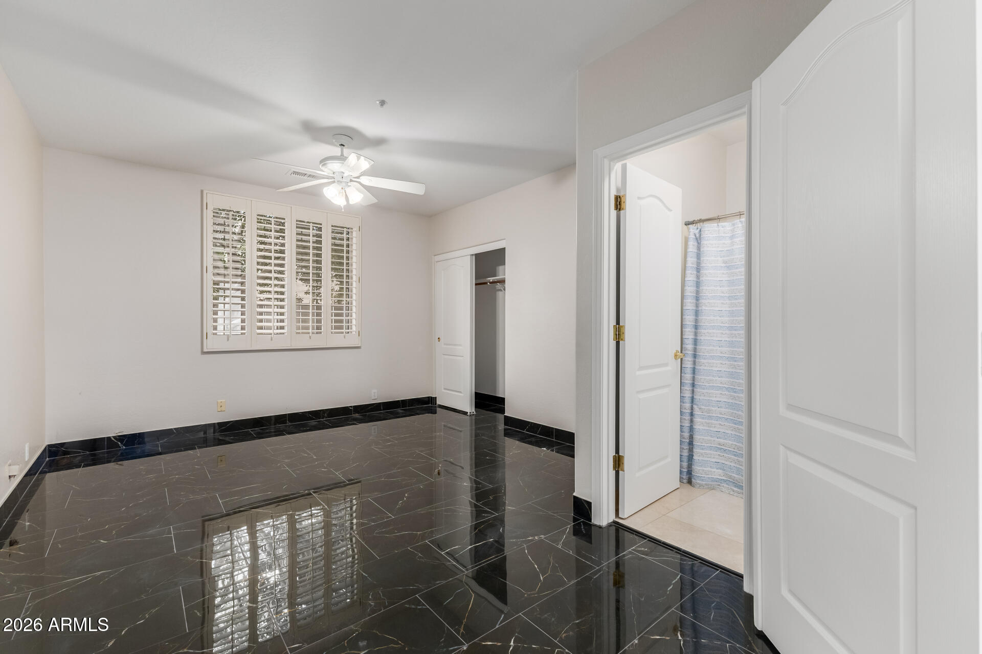 10872 East Raintree Drive Scottsdale, AZ 85255 - Photo 20 of 54 a view of empty room with windows
