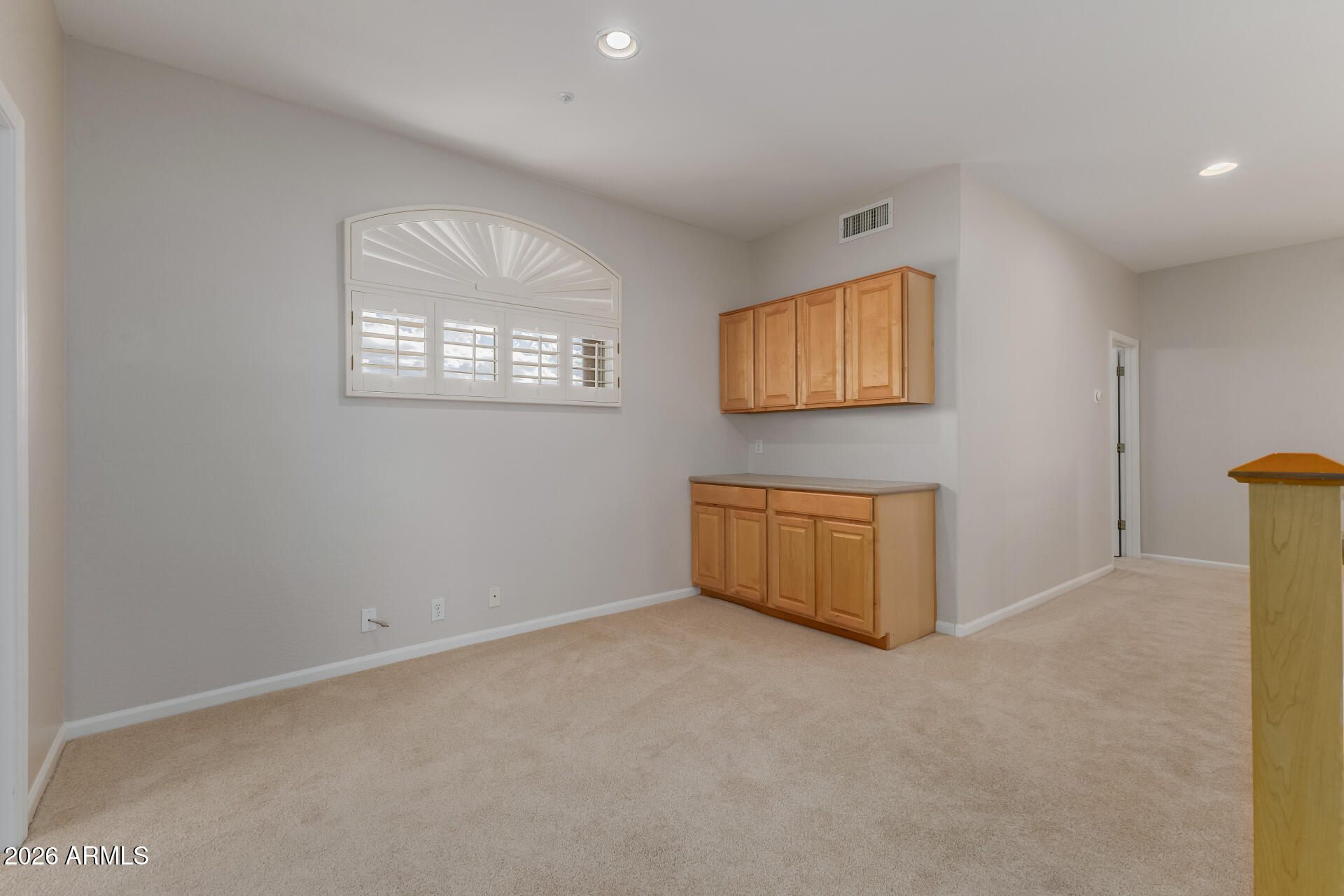 10872 East Raintree Drive Scottsdale, AZ 85255 - Photo 25 of 54 a view of an empty room with windows