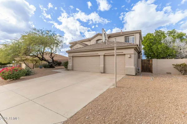 front view of a house with a garage
