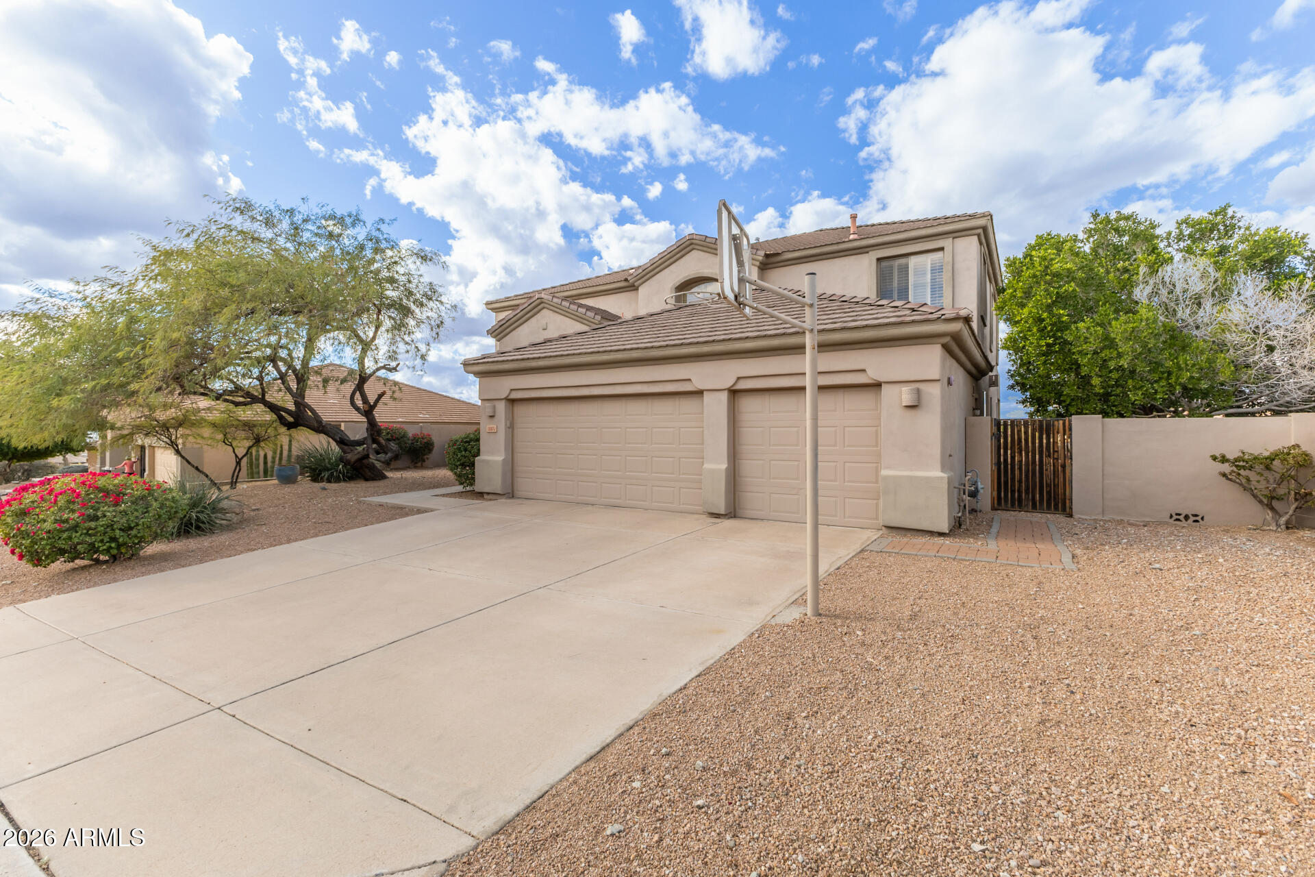 10872 East Raintree Drive Scottsdale, AZ 85255 - Photo 3 of 54 front view of a house with a garage