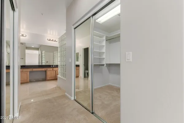 a view of an empty walk in closet