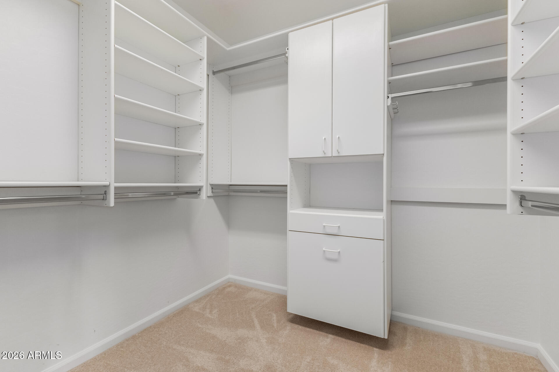 10872 East Raintree Drive Scottsdale, AZ 85255 - Photo 35 of 54 a view of an empty walk in closet
