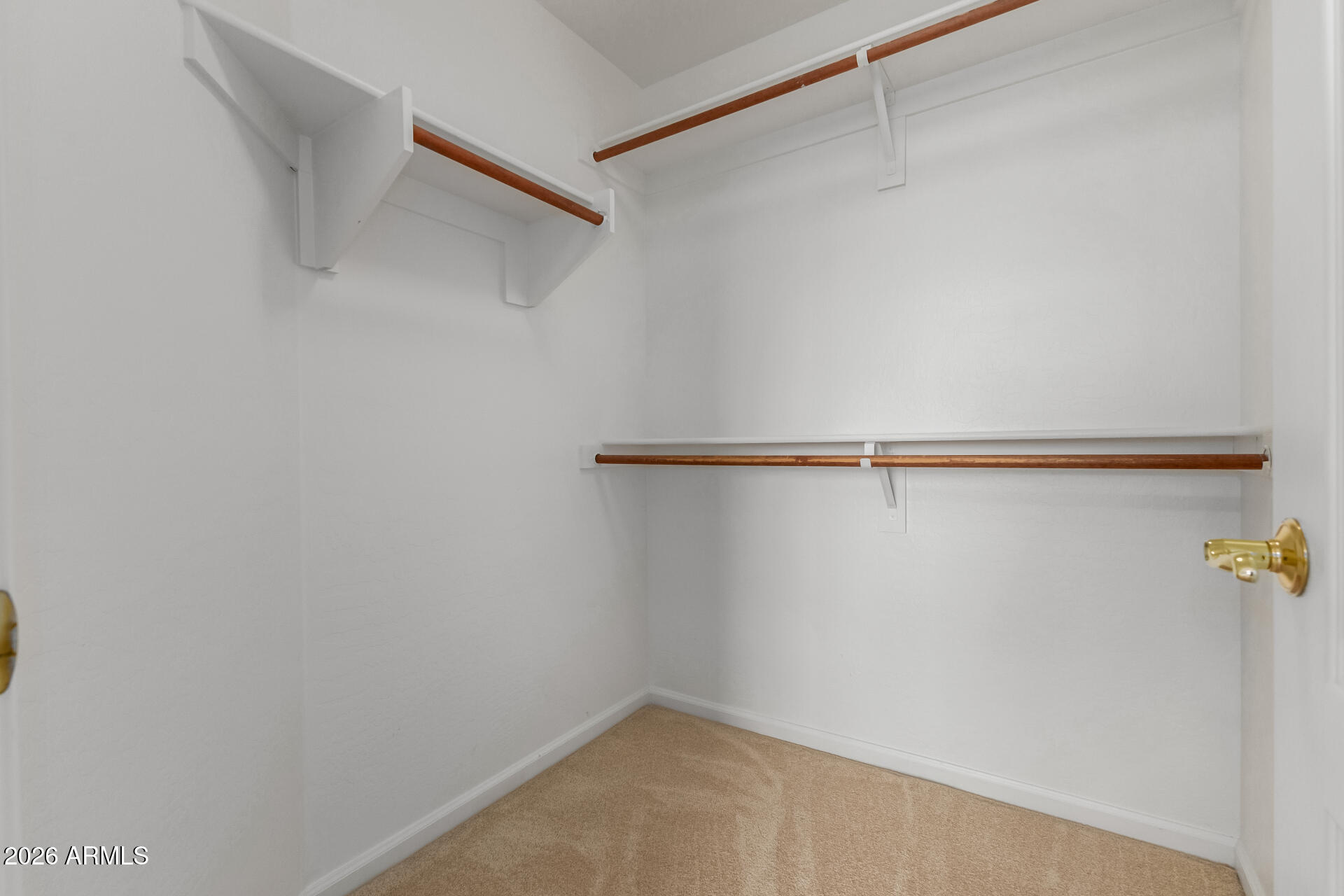 10872 East Raintree Drive Scottsdale, AZ 85255 - Photo 38 of 54 a view of a room with racks on the wall