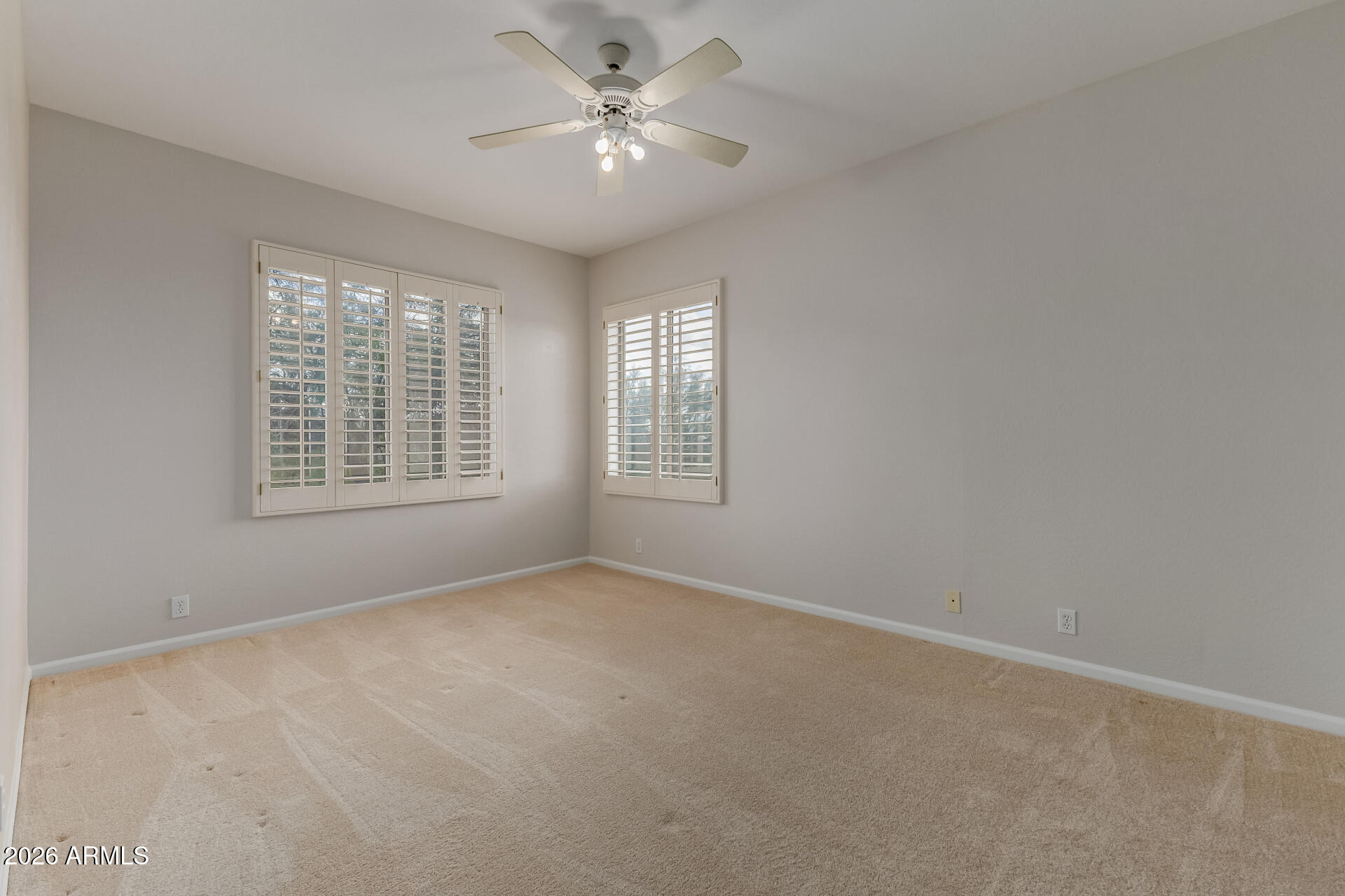 10872 East Raintree Drive Scottsdale, AZ 85255 - Photo 39 of 54 a view of an empty room with a window