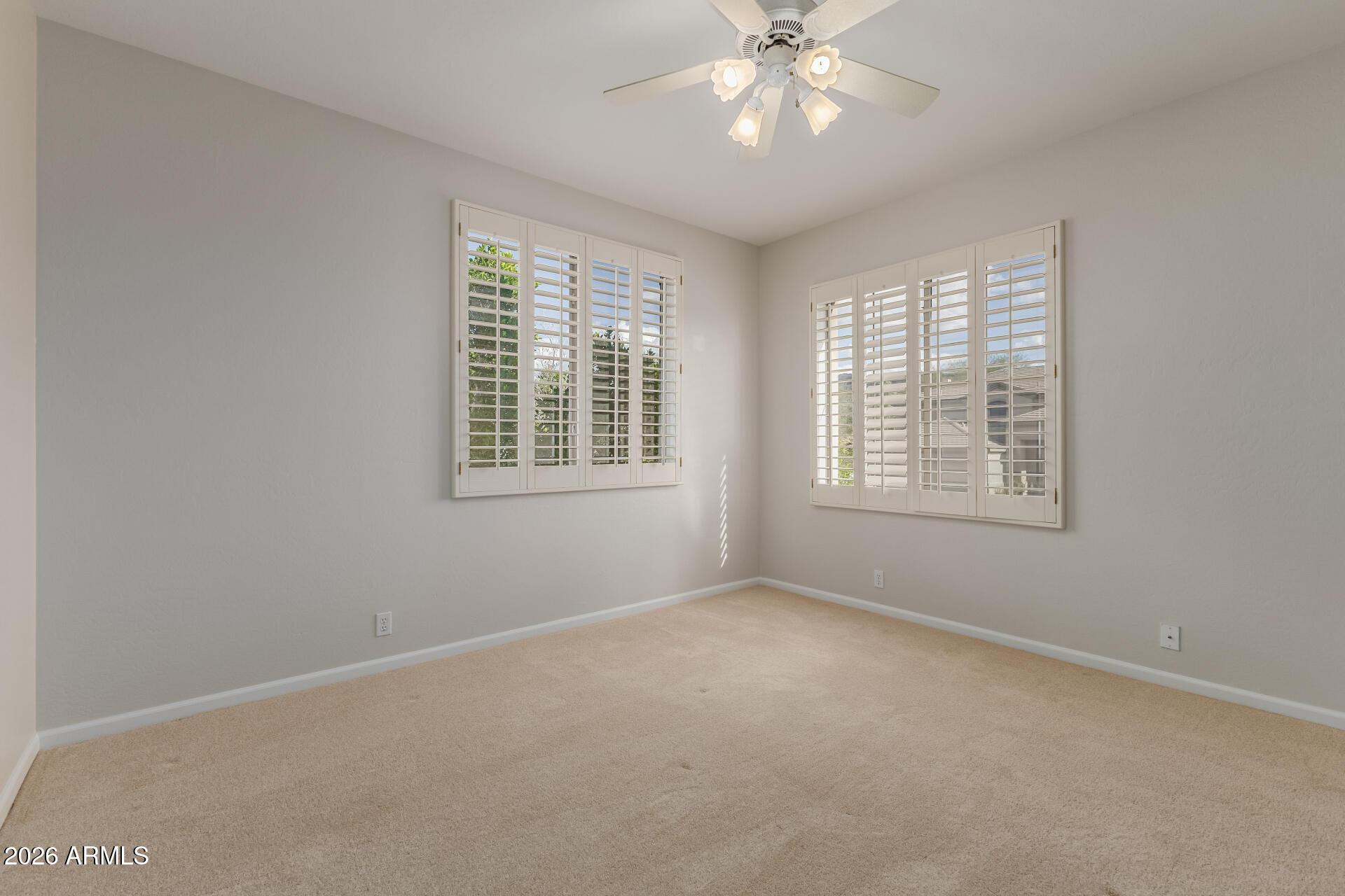 10872 East Raintree Drive Scottsdale, AZ 85255 - Photo 44 of 54 a view of an empty room with a window