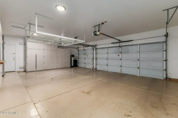 a view of a swimming pool with a yard