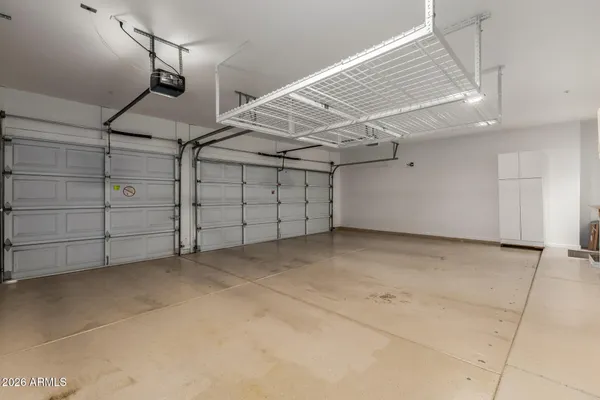 a view of a swimming pool with outdoor seating