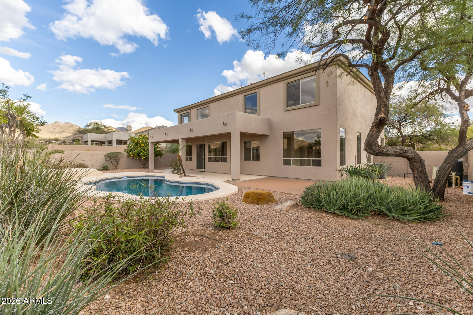 10872 East Raintree Drive Scottsdale, AZ 85255 - Photo 53 of 54 front view of a house with a yard