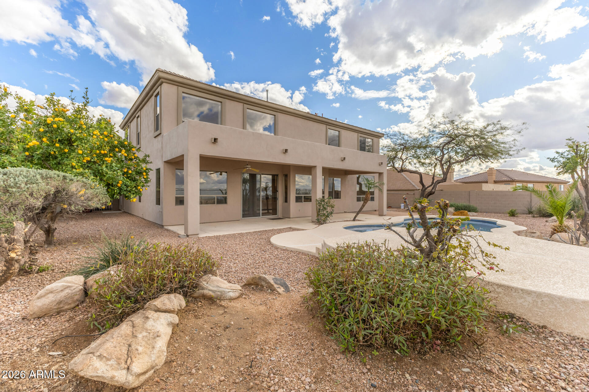 10872 East Raintree Drive Scottsdale, AZ 85255 - Photo 54 of 54 a view of a house with a yard