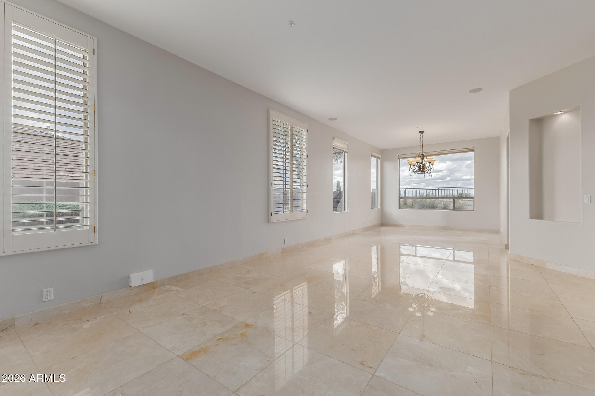 10872 East Raintree Drive Scottsdale, AZ 85255 - Photo 6 of 54 a view of an empty room with a window