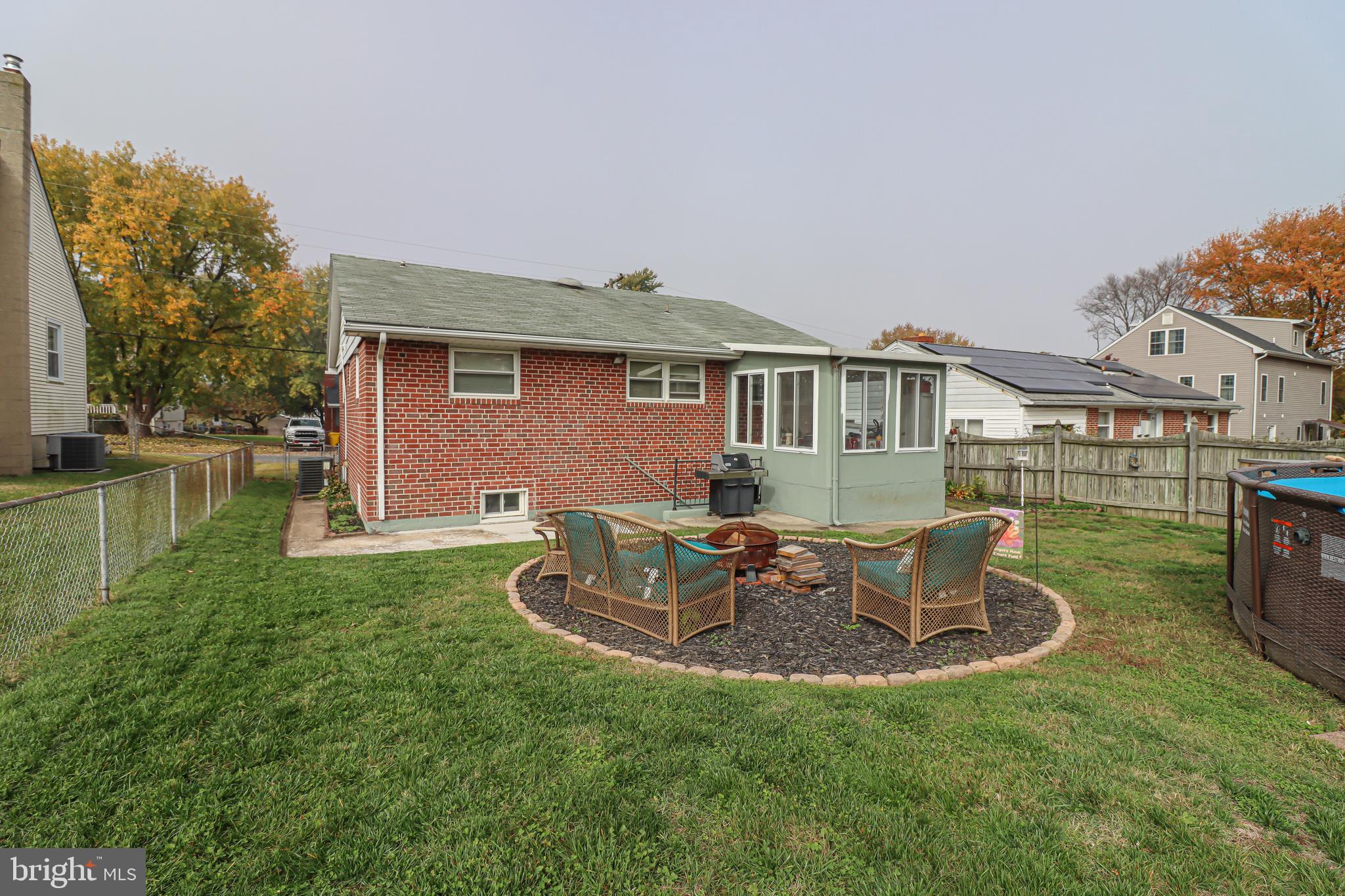 209 Chelsea Road Pasadena, MD 21122 - Photo 3 of 32 Backyard w/ Fire-Pit Area