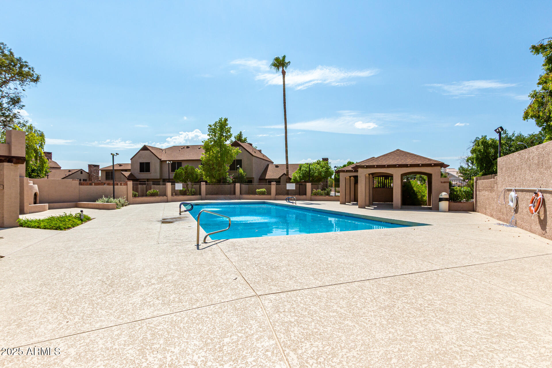 8111 West Wacker Road, Unit 1 Peoria, AZ 85381 - Photo 20 of 26 a view of a swimming pool with a slide