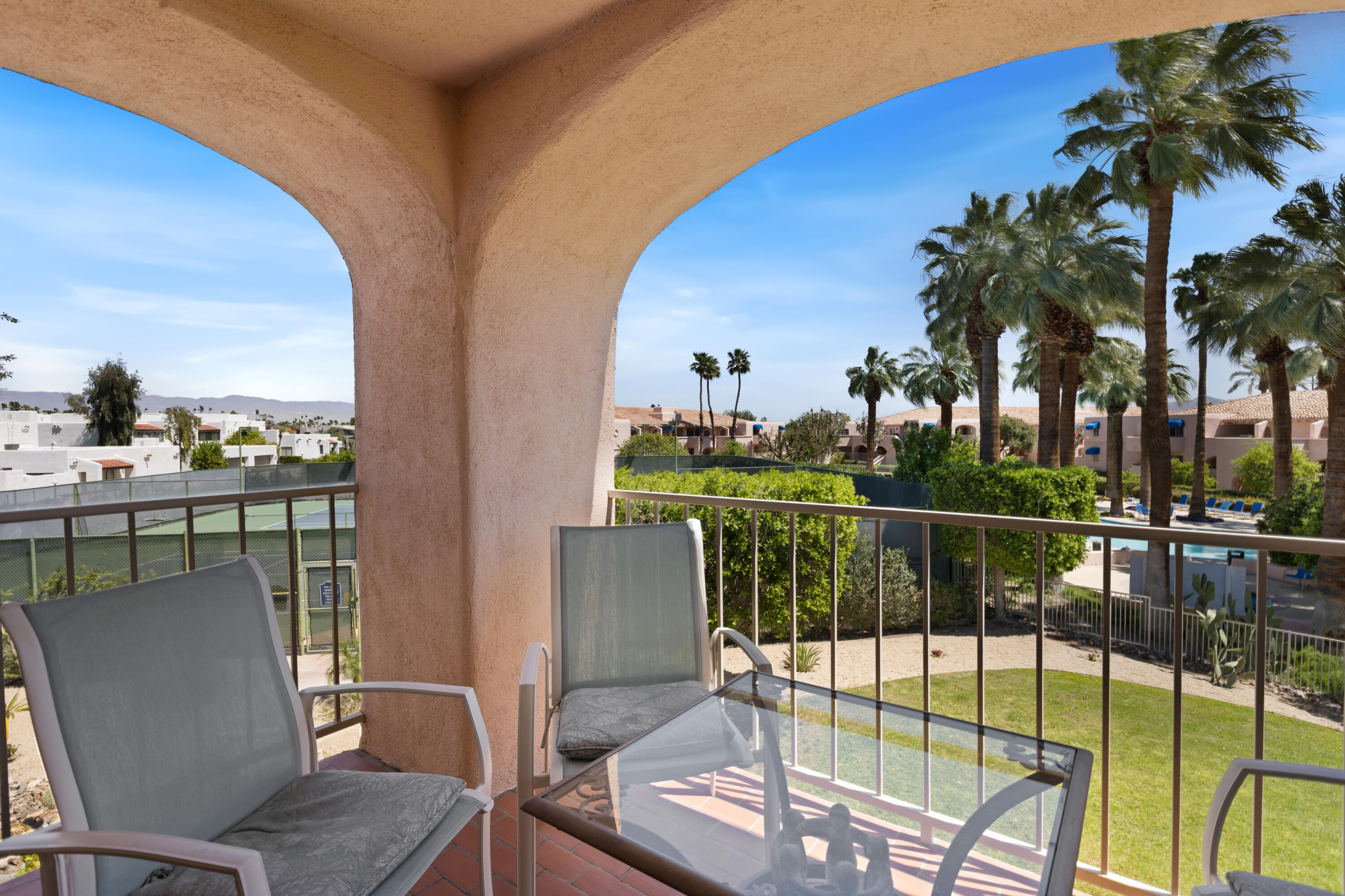 500 East Amado Road, Unit 613 Palm Springs, CA 92262 - Photo 16 of 28 a view of a balcony and dining room