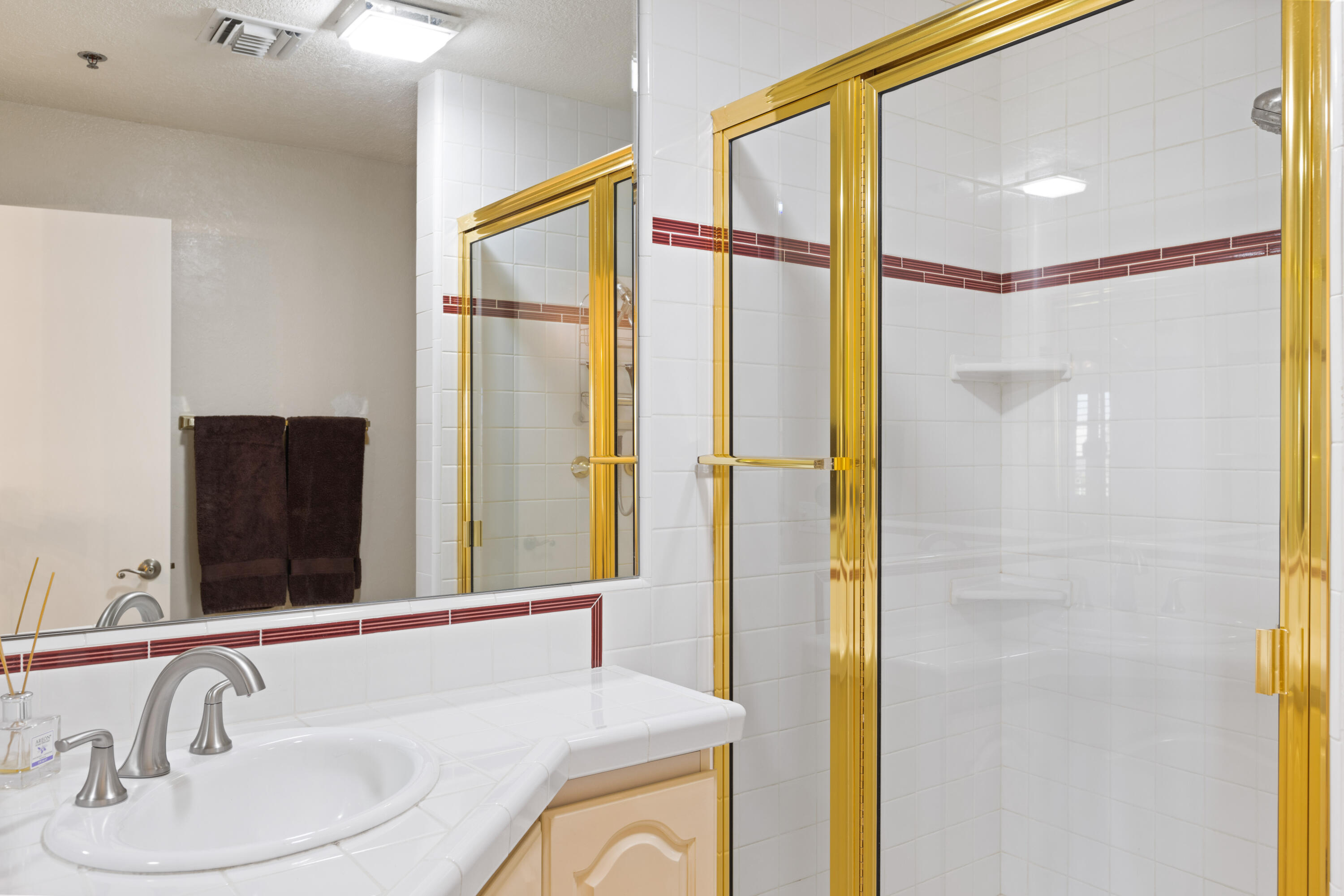 500 East Amado Road, Unit 613 Palm Springs, CA 92262 - Photo 22 of 28 a bathroom with a sink and a mirror