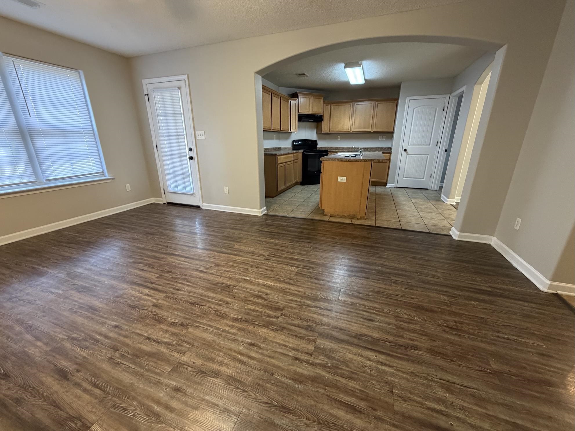 8712 Edney Ridge Drive Cordova, TN 38016 - Photo 18 of 18 a view of a kitchen with microwave and cabinets
