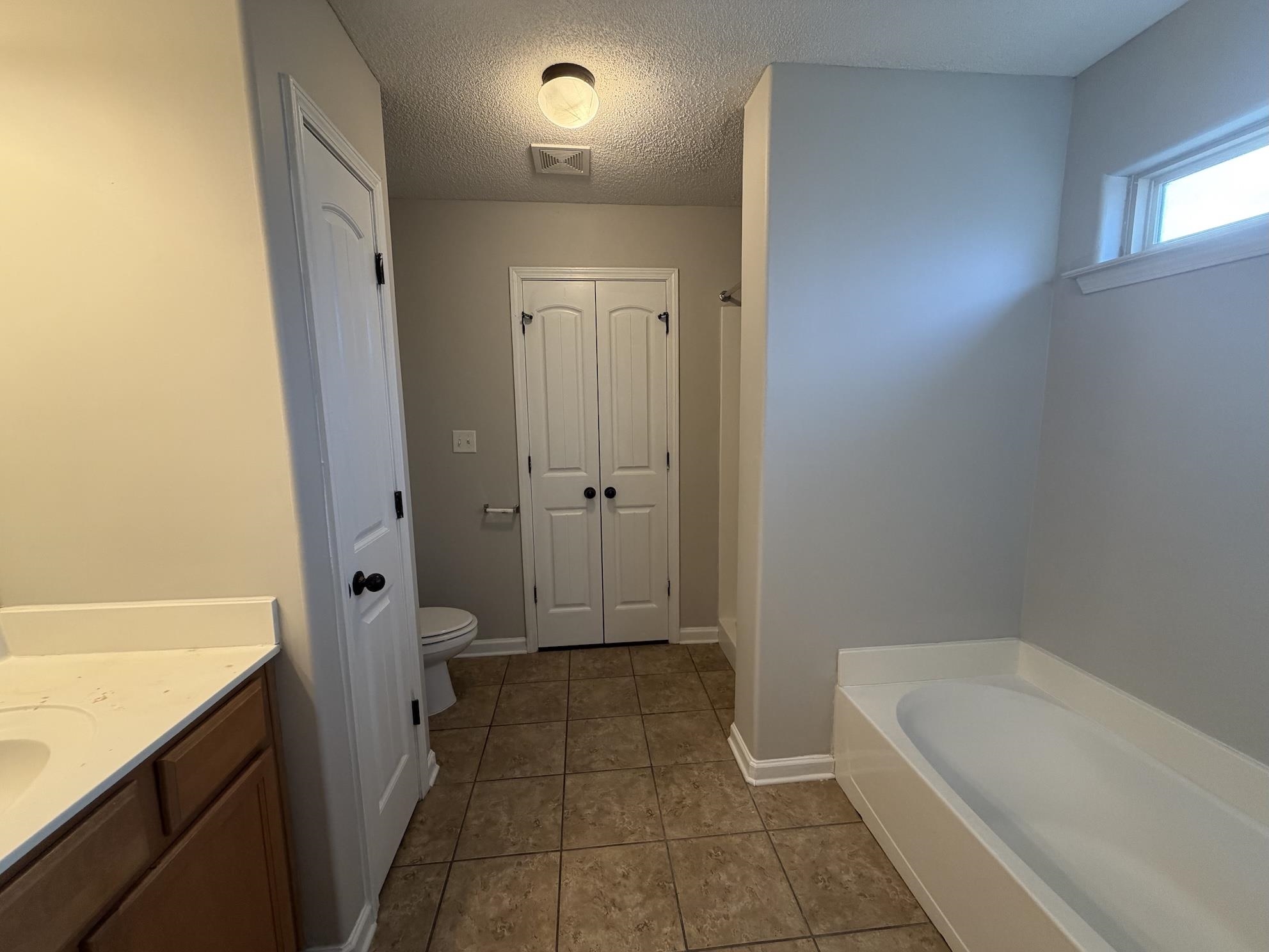 8712 Edney Ridge Drive Cordova, TN 38016 - Photo 7 of 18 a bathroom with a tub shower and sink