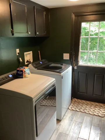 a kitchen with a stove and a microwave