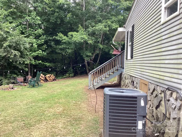 a view of stairs and yard