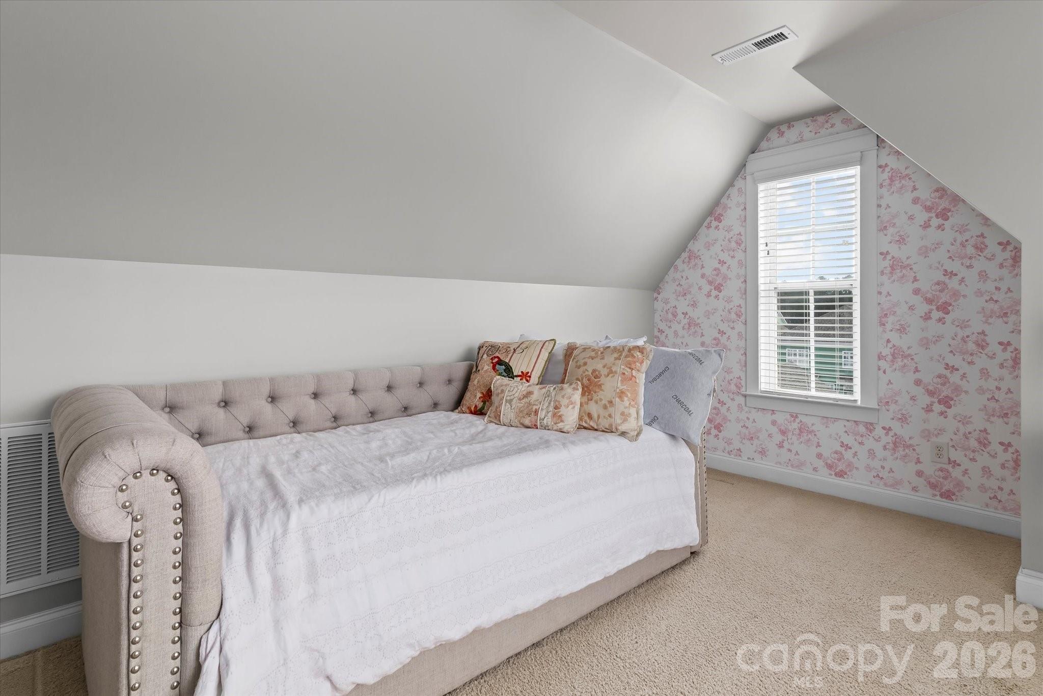 301 Bridges Farm Road Mooresville, NC 28115 - Photo 32 of 46 a bedroom with a bed and a window