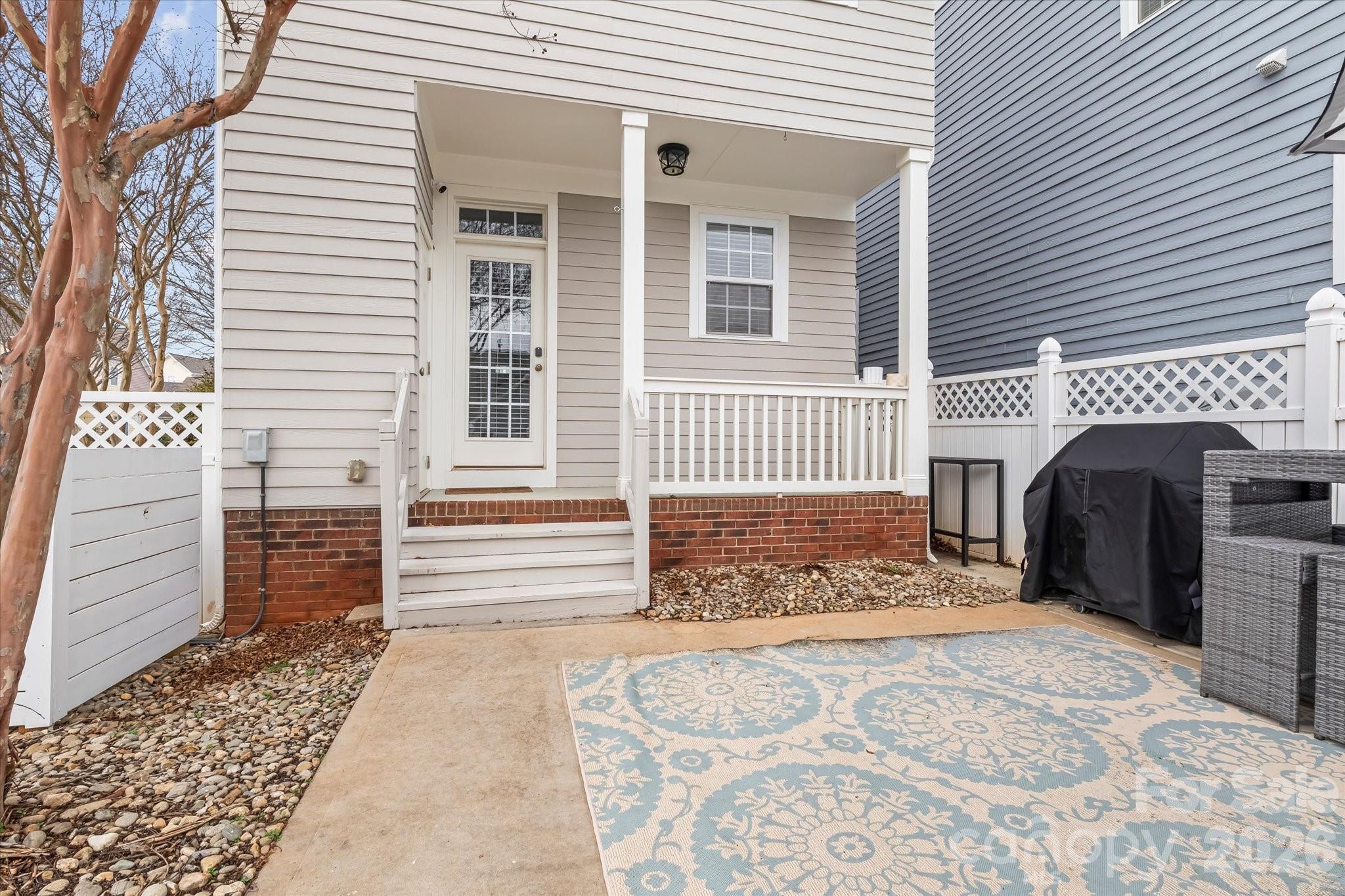 301 Bridges Farm Road Mooresville, NC 28115 - Photo 36 of 46 a view of a wooden house with a bed and a table