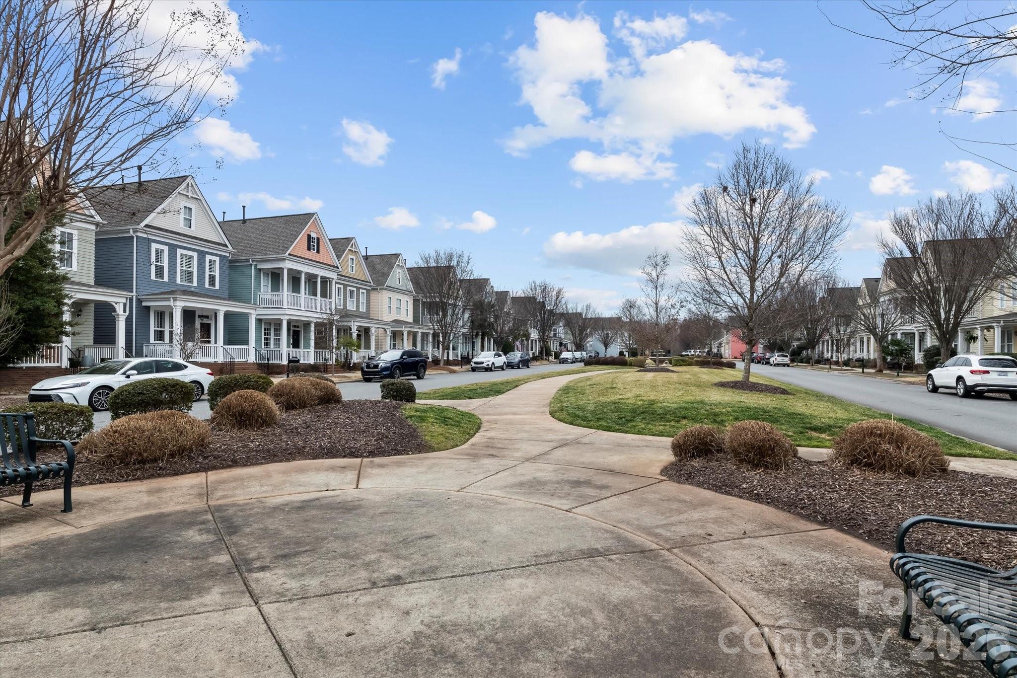 301 Bridges Farm Road Mooresville, NC 28115 - Photo 5 of 46 a view of multiple house with outdoor space and swimming pool