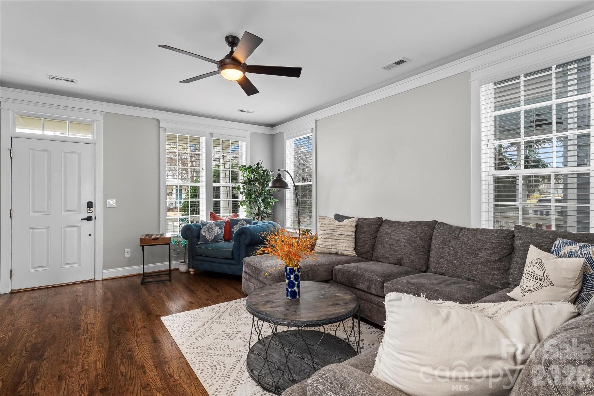 301 Bridges Farm Road Mooresville, NC 28115 - Photo 8 of 46 a living room with furniture and a large window