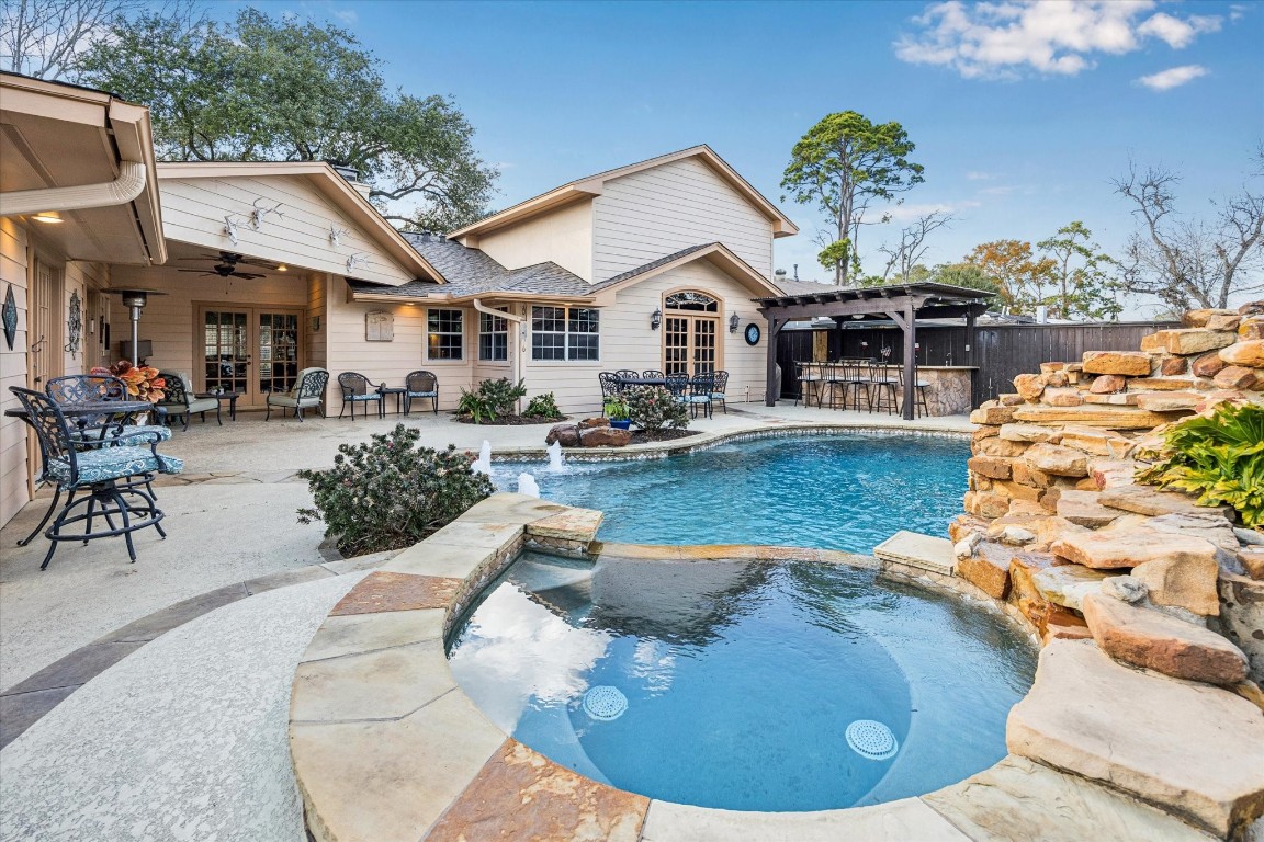 a view of a house with swimming pool
