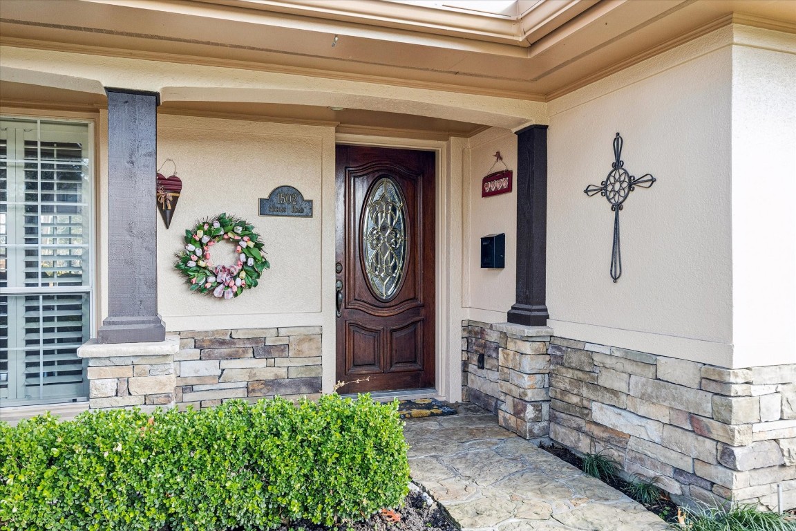 1502 Adkins Road Houston, TX 77055 - Photo 5 of 35 a front view of a house with entryway