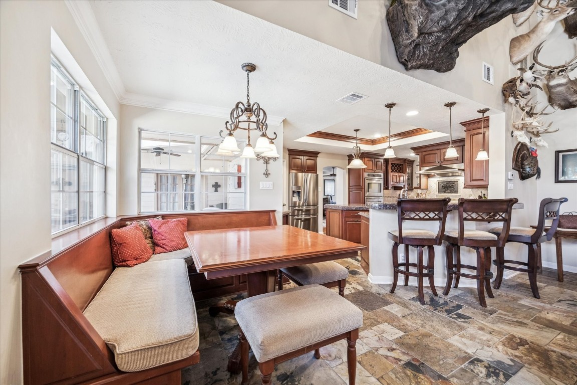 1502 Adkins Road Houston, TX 77055 - Photo 9 of 35 a living room with furniture a table and chairs