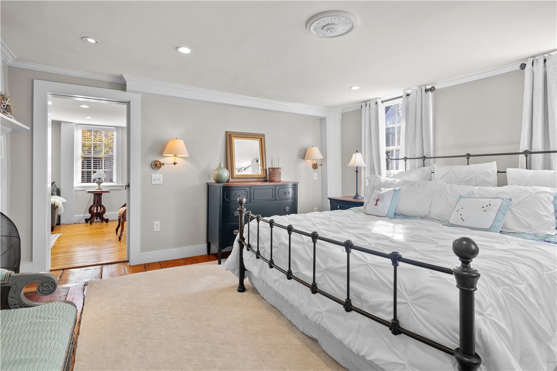 70 Mill Street Newport, RI 02840 - Photo 27 of 50 Looking to den from primary bedroom. Solid pocket door is discreetly tucked into wall.