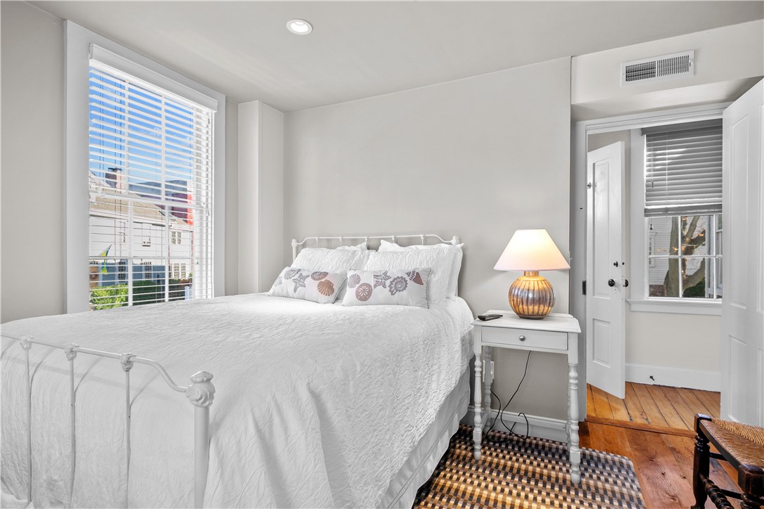 70 Mill Street Newport, RI 02840 - Photo 36 of 50 Guest bedroom (3) on corner of home for cheery double windows.