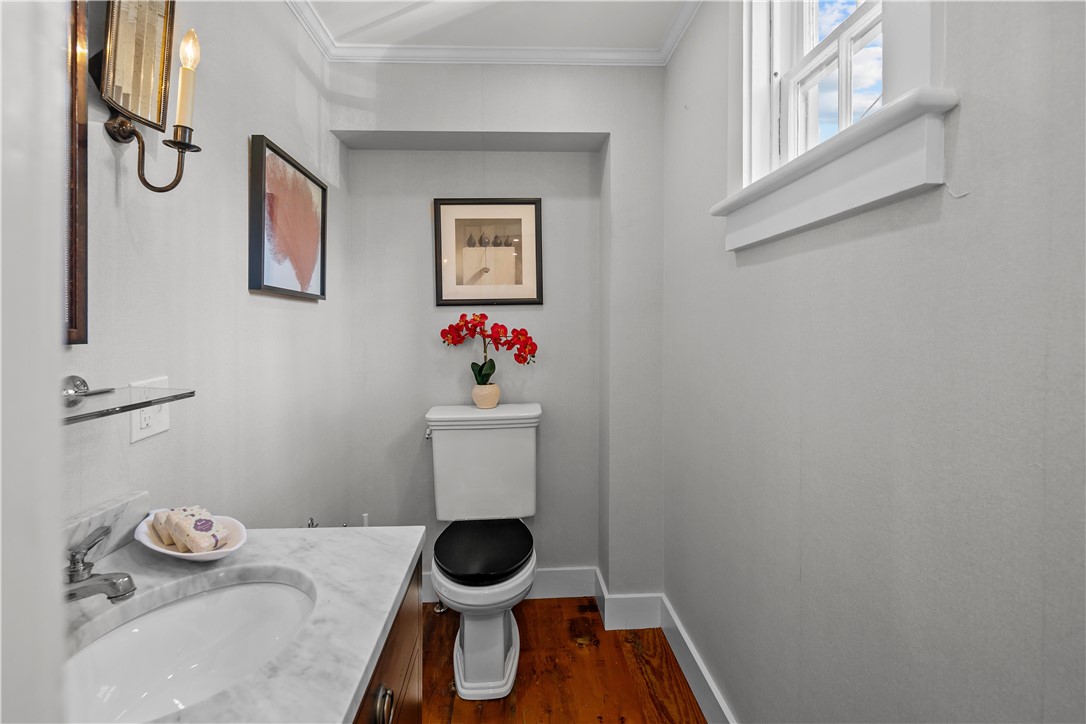 70 Mill Street Newport, RI 02840 - Photo 10 of 50 Powder room is discreetly located down hallway off living/great room and kitchen.