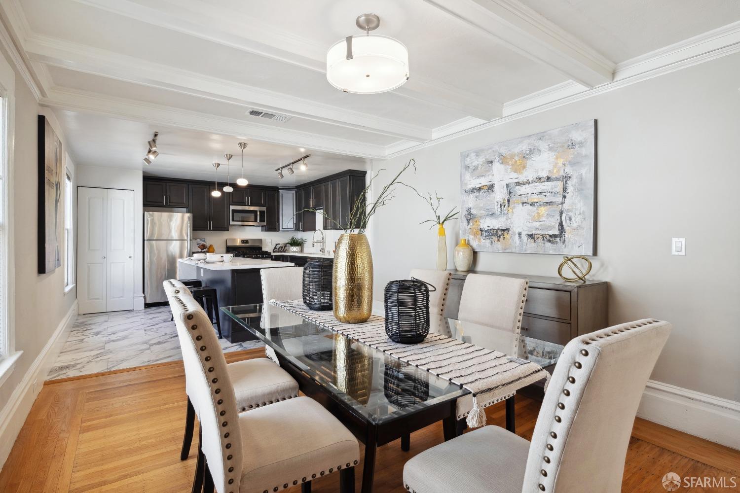 1817 Woolsey Street Berkeley, CA 94703 - Photo 14 of 35 a dining room with furniture and chandelier