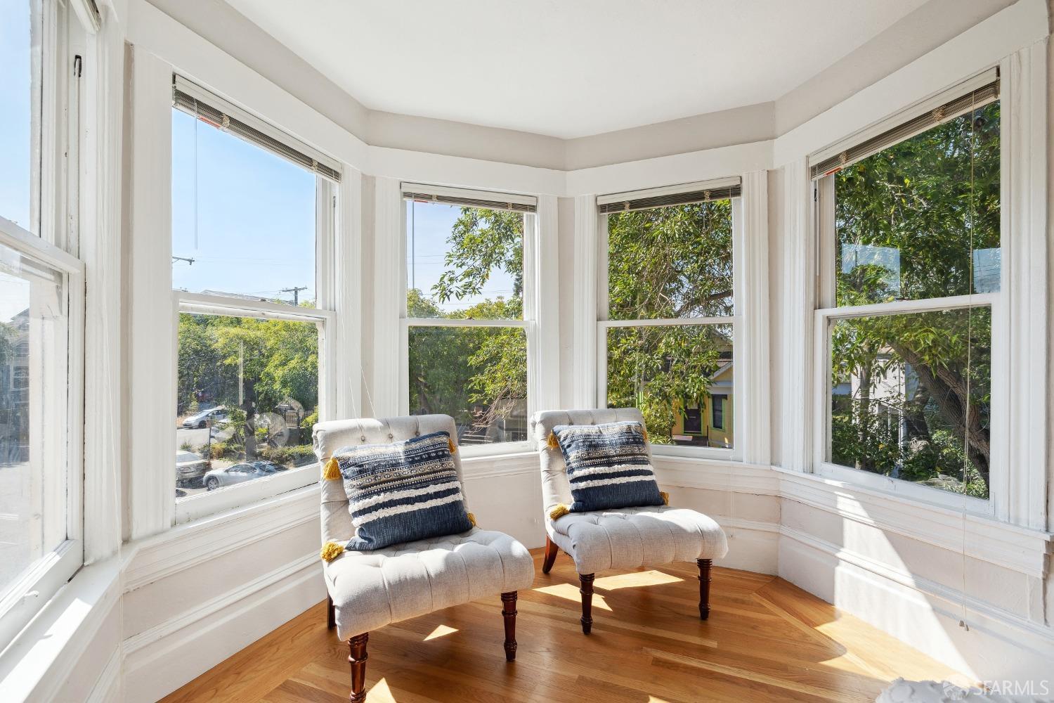 1817 Woolsey Street Berkeley, CA 94703 - Photo 29 of 35 a living room with furniture and windows