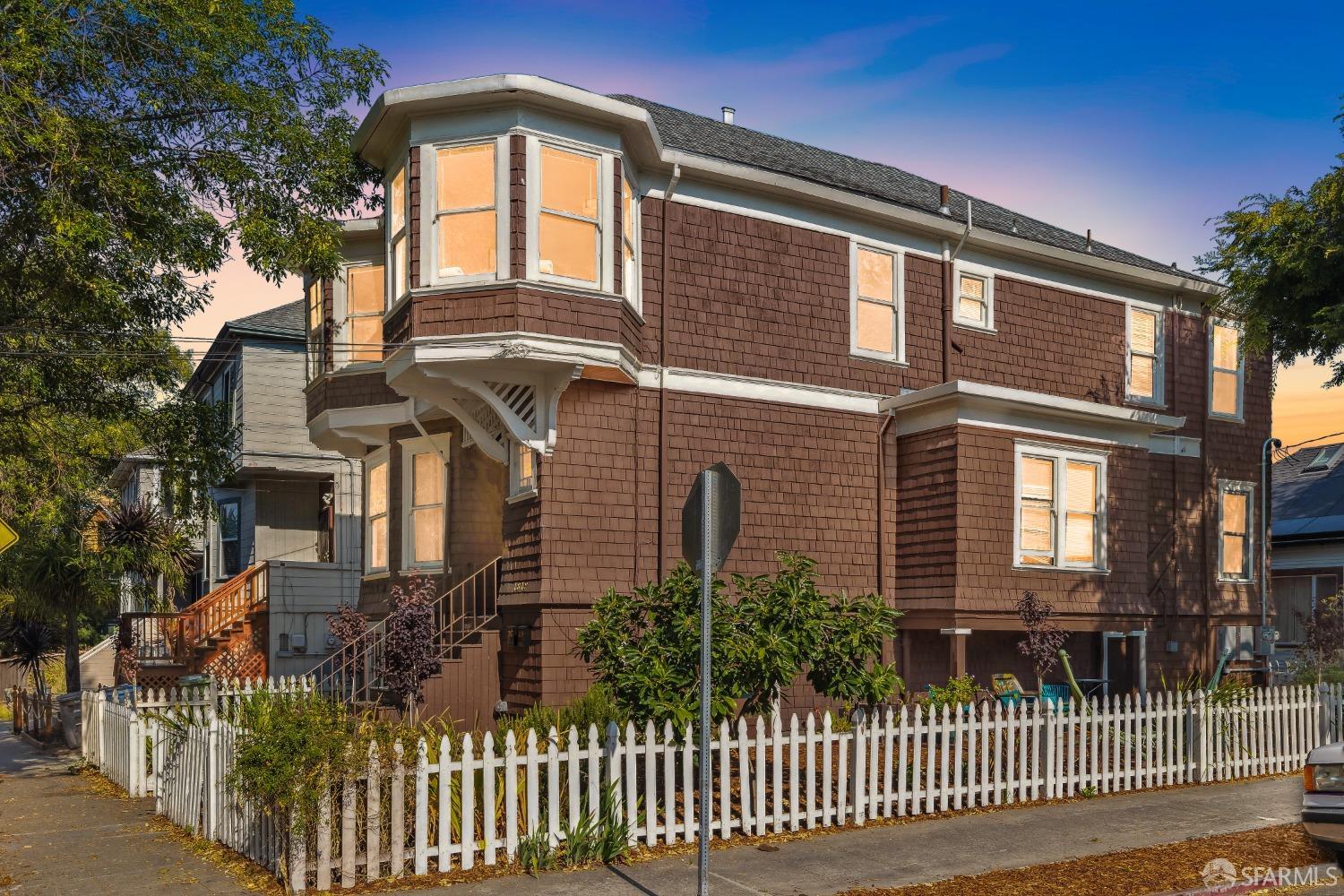 1817 Woolsey Street Berkeley, CA 94703 - Photo 34 of 35 a front view of a house with a garden