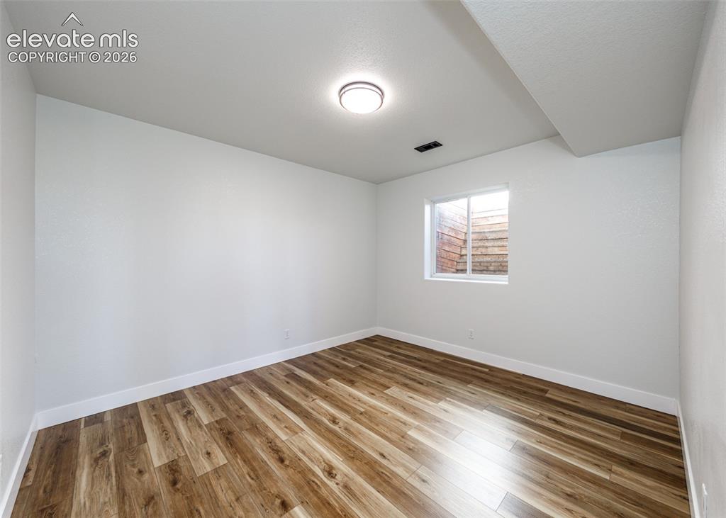 1120 Newton Road Pueblo, CO 81005 - Photo 27 of 46 wooden floor in a room