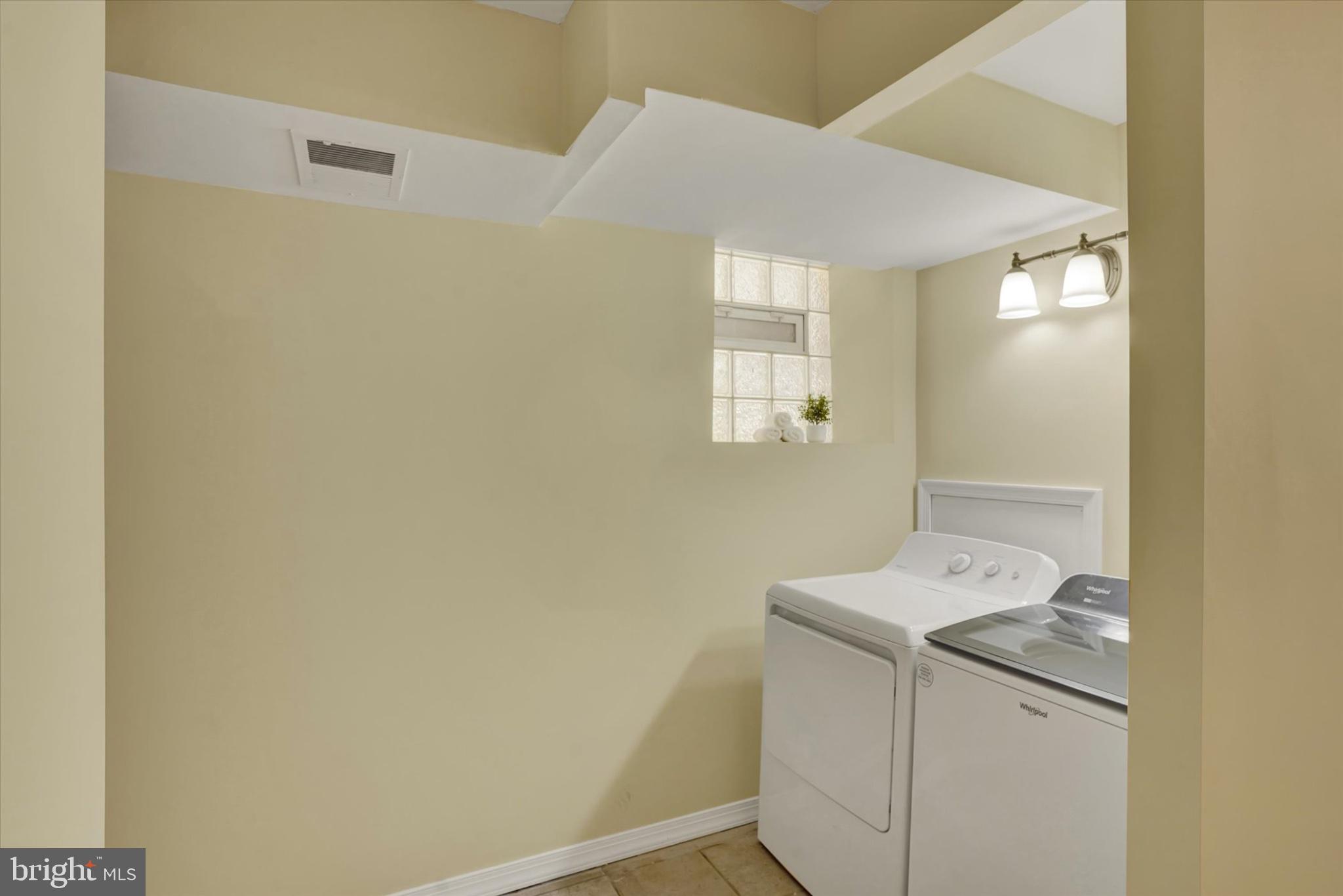 127 West Washington Lane Philadelphia, PA 19144 - Photo 27 of 29 Bright and airy laundry space.
